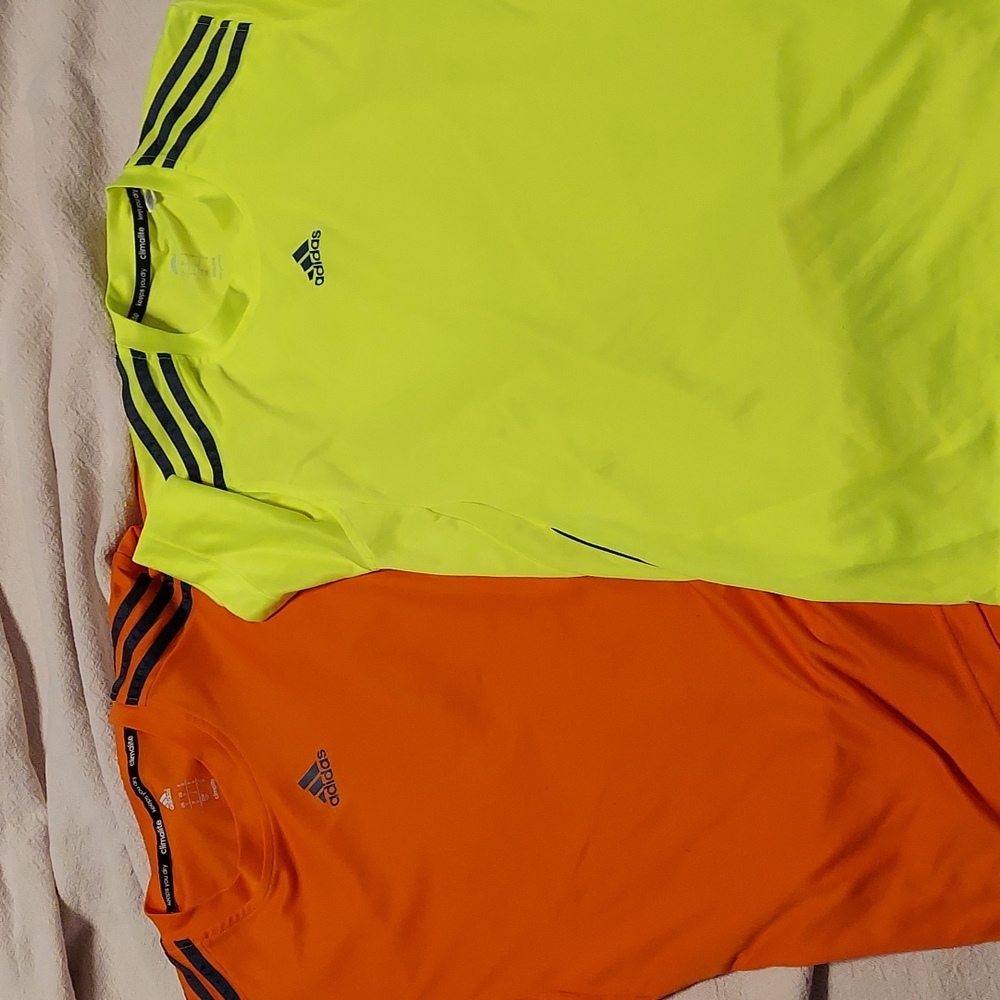 2 men's size small moisture wicking workout shirts